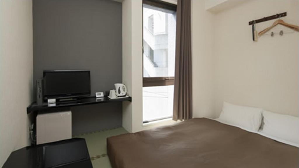 Hotel Plaza Inn Токушима Стая снимка